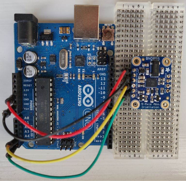 BNO055 absolute orientation sensor connected to an Arduino Uno. Communication is via the inter-integrated circuit (I2C) protocol. Only four wires are required: 5V power supply, ground (power and logic), I2C clock and I2C data.
